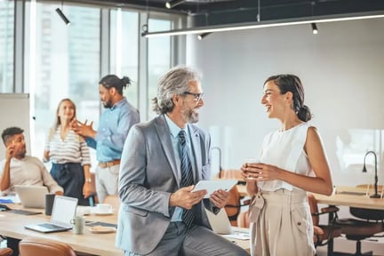Web_Desktop-Colleagues Engaging in Discussion at Modern Office Meeting